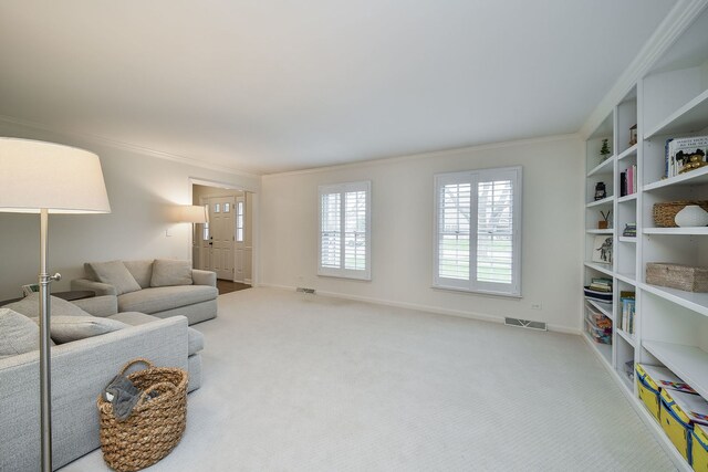 1007 Canonero Dr, Naperville, IL 60540 - living room featuring crown molding, carpet floors, baseboards, and visible vents
