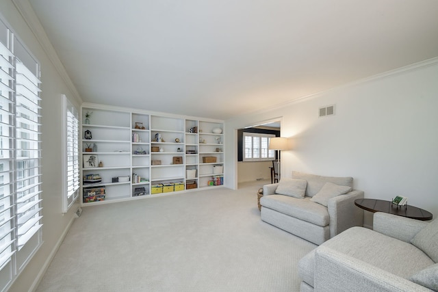 1007 Canonero Dr, Naperville, IL 60540 - carpeted living room featuring ornamental molding and visible vents