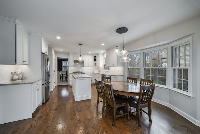 1007 Canonero Dr, Naperville, IL 60540 - dining room with dark wood-style flooring, baseboards, and recessed lighting