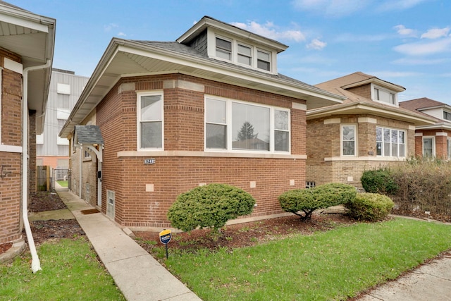 8742 S Justine St, Chicago, IL 60620 - view of property exterior featuring a gate, fence, and brick siding