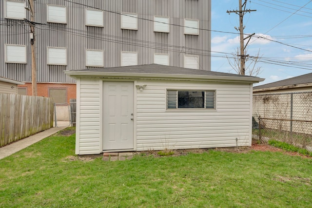 8742 S Justine St, Chicago, IL 60620 - view of outbuilding with a fenced backyard and an outdoor structure