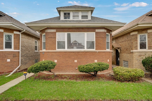 8742 S Justine St, Chicago, IL 60620 - view of front of house with brick siding and a shingled roof
