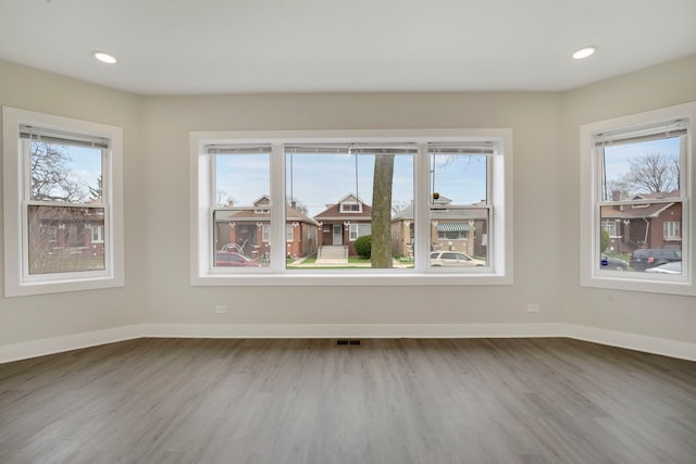 8742 S Justine St, Chicago, IL 60620 - empty room featuring baseboards and a wealth of natural light