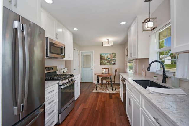1603 Aurora Way, Normal, IL 61761 - kitchen with appliances with stainless steel finishes, a sink, white cabinets, recessed lighting, and dark wood-style flooring
