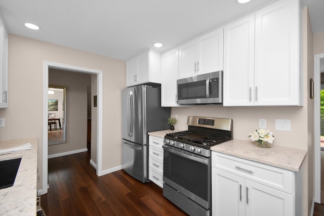 1603 Aurora Way, Normal, IL 61761 - kitchen with stainless steel appliances, baseboards, dark wood-type flooring, white cabinetry, and recessed lighting
