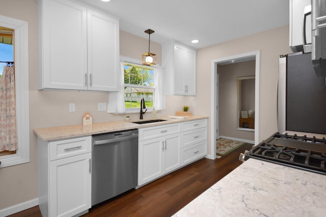 1603 Aurora Way, Normal, IL 61761 - kitchen featuring appliances with stainless steel finishes, a sink, dark wood-type flooring, white cabinets, and baseboards