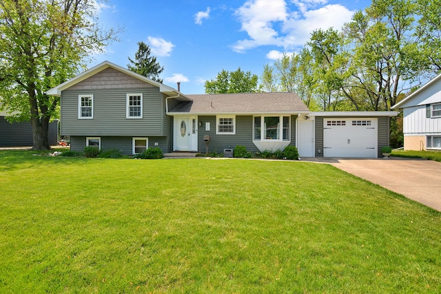 1603 Aurora Way, Normal, IL 61761 - split level home with driveway, a garage, and a front lawn