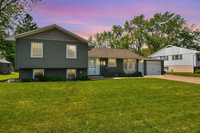 1603 Aurora Way, Normal, IL 61761 - split level home featuring driveway, a front yard, and an attached garage