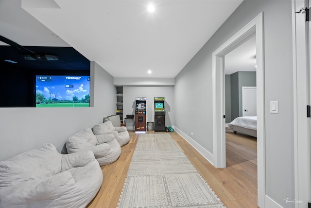 interior space with recessed lighting, baseboards, and light wood finished floors