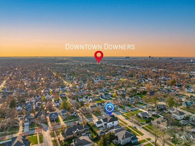aerial view at dusk with a residential view