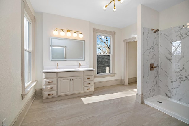 505 S Indiana Ave, Kankakee, IL 60901 - full bathroom featuring vanity, baseboards, a marble finish shower, and wood finished floors