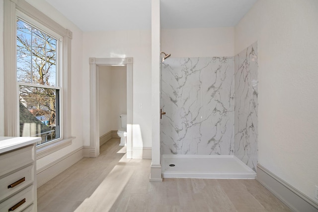 505 S Indiana Ave, Kankakee, IL 60901 - full bath with toilet, wood finished floors, and a marble finish shower