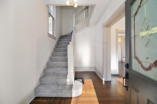 505 S Indiana Ave, Kankakee, IL 60901 - entryway with baseboards, stairway, a chandelier, and wood finished floors