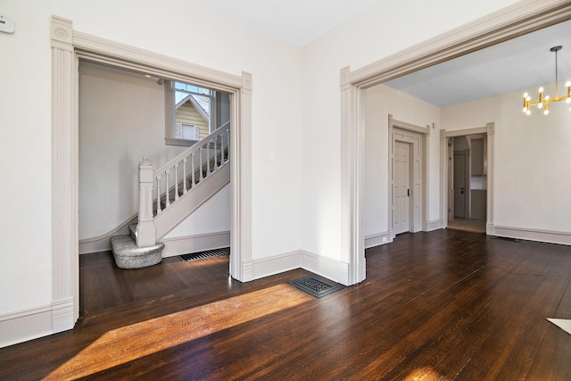 505 S Indiana Ave, Kankakee, IL 60901 - interior space with a chandelier, hardwood / wood-style floors, baseboards, and stairs