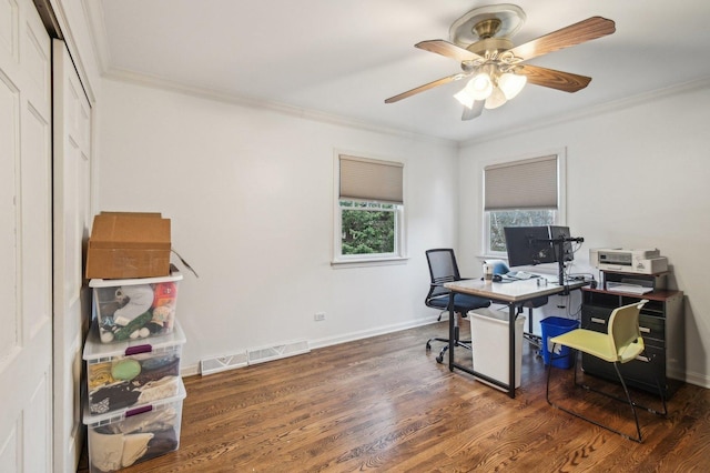 office with visible vents, a ceiling fan, crown molding, and wood finished floors