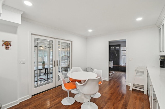 dining space featuring crown molding, recessed lighting, french doors, and dark wood finished floors