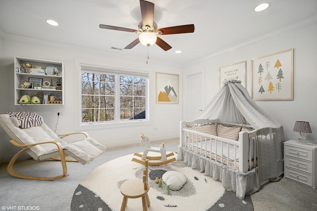 carpeted bedroom with crown molding, ceiling fan, and recessed lighting