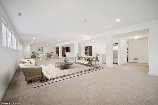 living room with light carpet, baseboards, visible vents, and recessed lighting