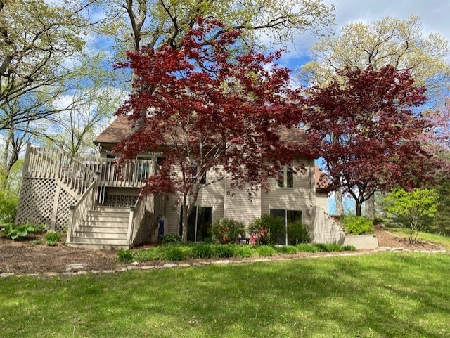 130333020 E St, Spring Valley, IL 61362 - view of home's exterior with a shingled roof, stairway, and a chimney