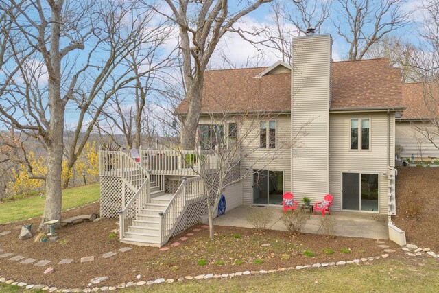 130333020 E St, Spring Valley, IL 61362 - ranch-style house featuring a chimney, a front yard, and a shingled roof