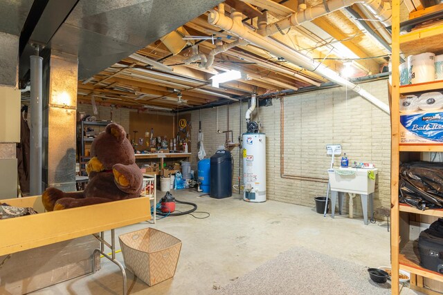 130333020 E St, Spring Valley, IL 61362 - unfinished basement featuring water heater and brick wall