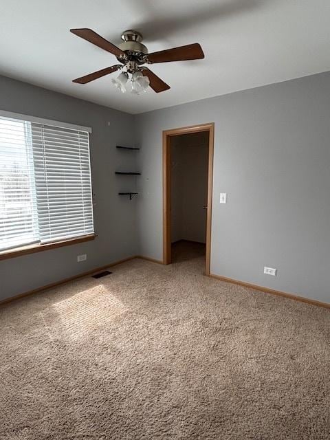 678 Meridian Way, Antioch, IL 60002 - spare room featuring carpet flooring, baseboards, a ceiling fan, and visible vents