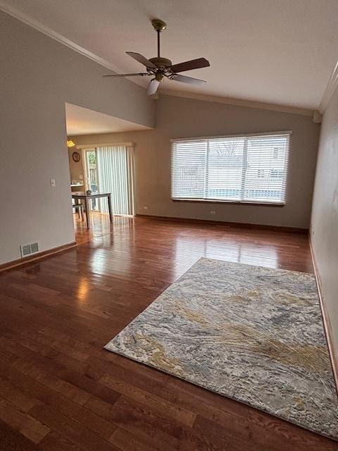 678 Meridian Way, Antioch, IL 60002 - empty room with visible vents, ornamental molding, ceiling fan, vaulted ceiling, and wood finished floors