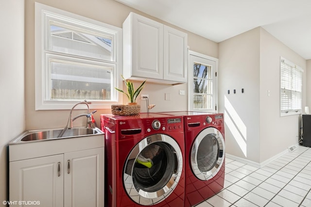 1130 Crestwood Dr, Northbrook, IL 60062 - laundry area featuring a sink, light tile patterned floors, cabinet space, and washer and dryer