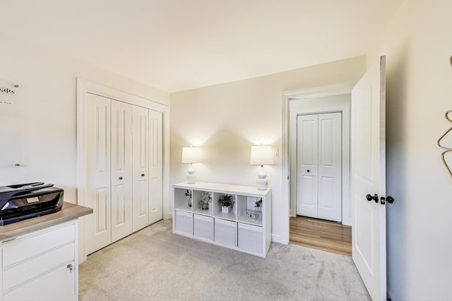 bedroom with light carpet