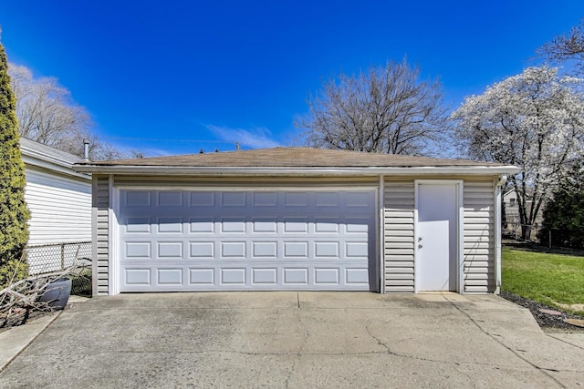 detached garage with fence