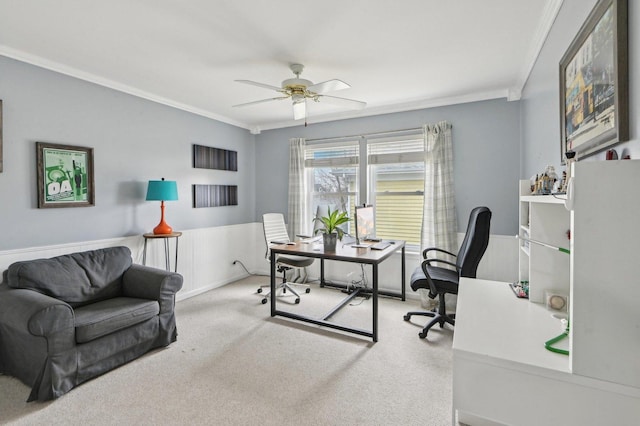 office area with carpet flooring, crown molding, and a ceiling fan