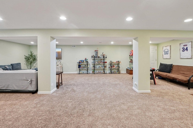 finished basement featuring recessed lighting, baseboards, and carpet floors
