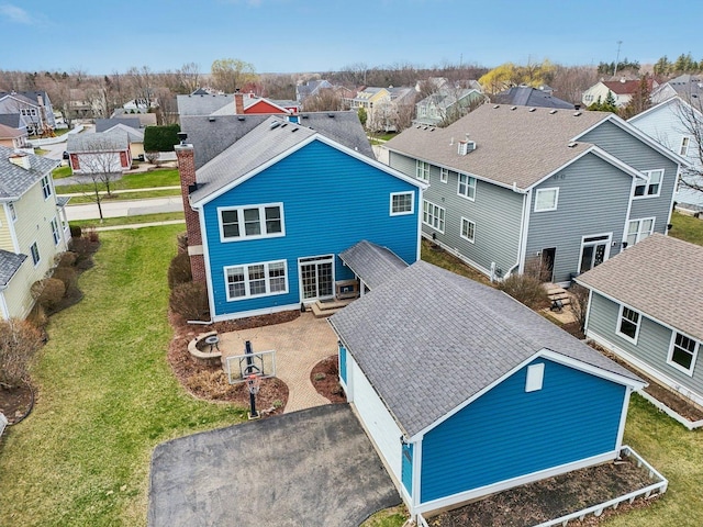 drone / aerial view with a residential view