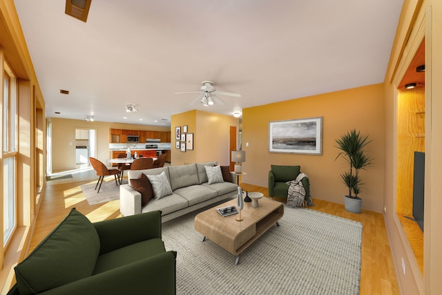 2S154 Lloyd Ave, Lombard, IL 60148 - living room featuring visible vents, light wood finished floors, and ceiling fan