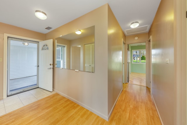 2S154 Lloyd Ave, Lombard, IL 60148 - hallway featuring attic access, baseboards, visible vents, and light wood finished floors