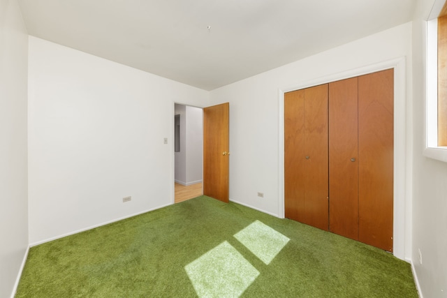 2S154 Lloyd Ave, Lombard, IL 60148 - unfurnished bedroom with baseboards, carpet, and a closet