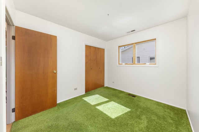 2S154 Lloyd Ave, Lombard, IL 60148 - unfurnished bedroom with visible vents, carpet, baseboards, and a closet