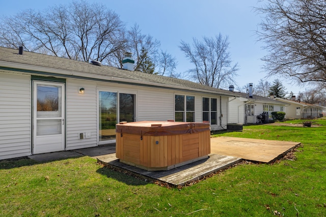 2S154 Lloyd Ave, Lombard, IL 60148 - back of house with a chimney, a hot tub, a yard, and a deck