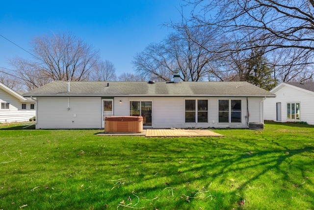 2S154 Lloyd Ave, Lombard, IL 60148 - rear view of house with a yard, a chimney, a hot tub, and a deck
