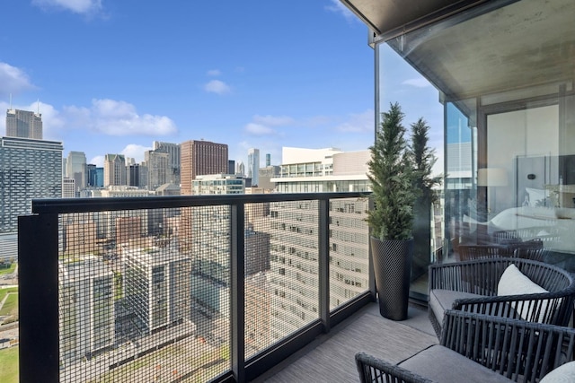 balcony featuring a city view