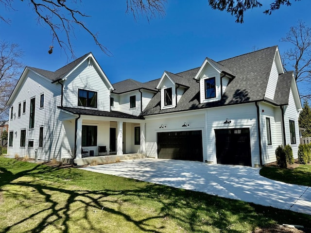 modern farmhouse style home with concrete driveway, roof with shingles, a front lawn, a garage, and covered porch