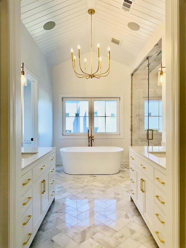 full bathroom with french doors, visible vents, a stall shower, and vanity