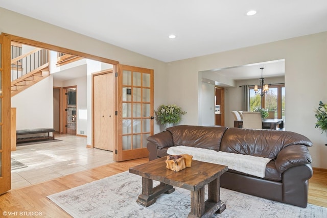 22846 W Lochanora Dr, Hawthorn Woods, IL 60047 - living area with light wood-style flooring, recessed lighting, stairway, a chandelier, and baseboards