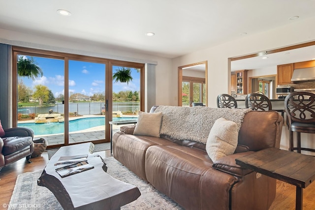 22846 W Lochanora Dr, Hawthorn Woods, IL 60047 - living area with recessed lighting, light wood-type flooring, and a water view