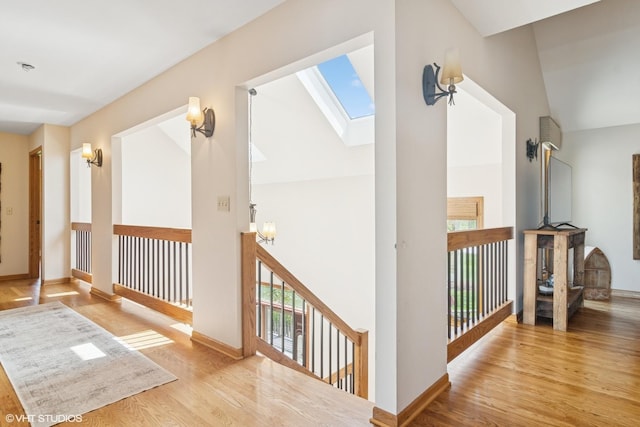 22846 W Lochanora Dr, Hawthorn Woods, IL 60047 - bonus room with a skylight, wood finished floors, a chandelier, baseboards, and high vaulted ceiling