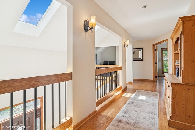 22846 W Lochanora Dr, Hawthorn Woods, IL 60047 - hallway featuring a skylight, wood finished floors, and baseboards