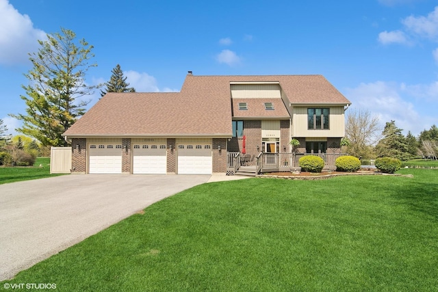 22846 W Lochanora Dr, Hawthorn Woods, IL 60047 - view of front of property featuring an attached garage, brick siding, driveway, and a front lawn