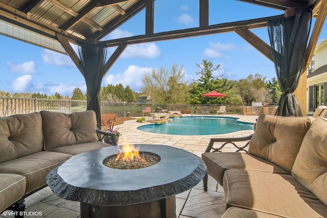 22846 W Lochanora Dr, Hawthorn Woods, IL 60047 - view of pool with an outdoor living space with a fire pit, a patio, and a fenced backyard
