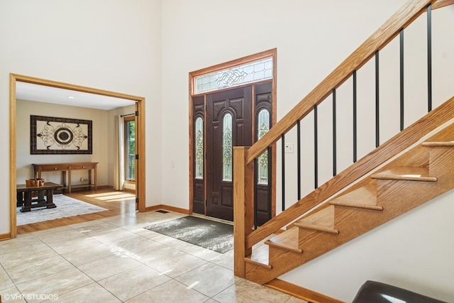 22846 W Lochanora Dr, Hawthorn Woods, IL 60047 - entrance foyer with stairs, a high ceiling, baseboards, and tile patterned flooring