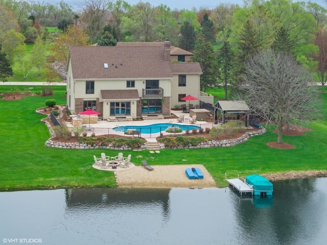 22846 W Lochanora Dr, Hawthorn Woods, IL 60047 - outdoor pool with an outdoor fire pit, a patio area, a water view, and a boat dock